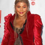 omg what did Lil Kim do to her face!