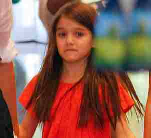 suri cruise cries over puppy walking Katie Holmes REALLY wanted out and receives only child support